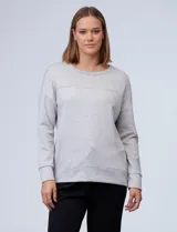 Buzo de cuello redondo y manga larga, confeccionado en tejido modal gris melange. Presenta un corte recto con costura horizontal en el pecho y puños ajustados.
