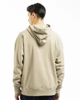 Buzo canguro negro con capucha, bolsillo frontal y corte oversized. Confeccionado en felpa de algodón y poliéster, con rib en puños y ruedo.