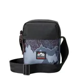 Morral pequeño Rip Curl con diseño estampado de montañas y red en tonos azules y grises. Cuenta con correa ajustable negra, cierre principal y parche frontal con el logo de la marca.