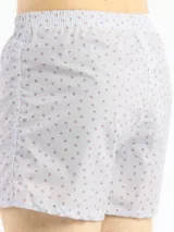 Bóxer Kevingston de algodón blanco con estampado integral de labios rojos. Cuenta con cintura elastizada y etiqueta de la marca en el frente.