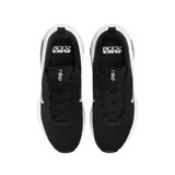 Championes Nike modelo Bella 7, color negro con entresuela blanca y detalles en negro translúcido. Presentan un diseño deportivo con malla transpirable, logo de la marca en el lateral y tecnología Air Zoom en el talón.