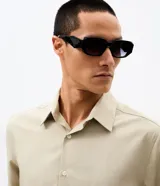 Camisa de manga larga Marfinno en color beige, con cuello camisero clásico y cierre frontal de botones.