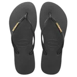 Sandalias Havaianas Slim Logo Metallic, color negro con logo dorado en las tiras.