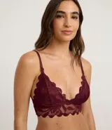 Soutien tipo bralette de encaje floral color bordó, con breteles finos ajustables y relleno triangular.