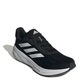 Championes de running Adidas modelo Response Super, color negro con las tres tiras laterales en gris claro y entresuela blanca. Presentan capellada de malla transpirable, entresuela con tecnología Dreamstrike+ para mayor amortiguación y suela con barras de goma para un agarre superior.
