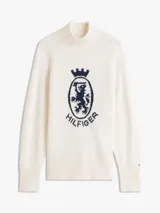 Sweater de Tommy Hilfiger confeccionado en pura lana, con cuello perkins y diseño de manga raglán. Presenta un escudo gráfico distintivo bordado en el pecho y acabados en punto canalé en cuello, puños y bajo.