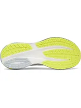 Championes de running Under Armour Velociti Distance, de color celeste con detalles en amarillo flúor, blanco y gris. Diseñados para carreras de larga distancia, cuentan con amortiguación UA HOVR+ y parte superior de malla transpirable.