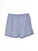 Short de baño azul con estampado de motivos marinos en celeste.