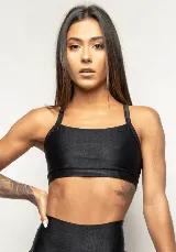 Top deportivo negro de poliamida y elastano, con forro y breteles finos.