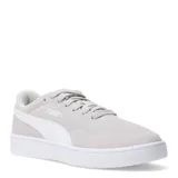 Championes urbanos Puma modelo Court Lally SD, color gris claro con detalles en blanco. Confeccionados en gamuza con la clásica franja lateral de la marca y suela de goma blanca.
