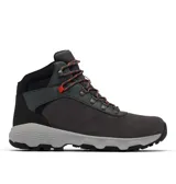 Bota de trekking Columbia modelo Newton Ridge, color gris oscuro con detalles en negro y cordones con toques naranjas. Presenta empeine de ante impermeable, herrajes metálicos y suela de caucho de alta tracción.