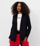 Blazer estructurado Blue Steel de punto roma con diseño de raya diplomática, mangas largas y cierre frontal con botones.