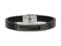 Pulsera de diseño moderno con banda de cuerina negra texturizada y placa central de acero inoxidable con detalles en negro. Cuenta con cierre de seguridad metálico.