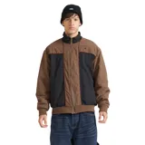 Campera Quiksilver modelo Isla, con diseño de bloques de color en tonos marrón y negro, cierre frontal completo, cuello alto y puños elásticos.