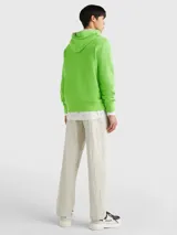 Buzo verde con capucha y cordón ajustable, confeccionado en felpa de algodón. Presenta un bolsillo tipo canguro y un monograma TH bordado en el pecho.