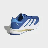 Championes de running Adidas modelo Duramo Speed 2, color azul con las tres tiras laterales en blanco y detalles en amarillo claro. Presentan tecnología de amortiguación Lightstrike en la entresuela y suela de caucho para mayor tracción.