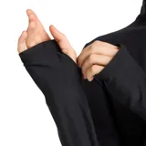 Campera deportiva New Balance color gris jaspeado, con cierre frontal completo, cuello alto y logo estampado en el pecho.