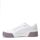 Championes urbanos Puma modelo Carina 2.0, color negro con la icónica franja lateral en blanco. Presentan una suela de plataforma de goma blanca con diseño texturizado y cierre mediante cordones.