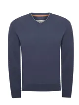 Sweater de tejido liviano con cuello en V, manga larga y calce regular. Presenta un diseño liso en color azul marino con una sutil línea en contraste en el borde interno del cuello.