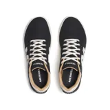 Championes Merrell modelo Cygnet Canvas, color negro con gran letra "M" blanca en el lateral, suela cupsole blanca y cordones claros.