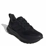 Championes de running Adidas modelo Ultra Run 5 TR, color negro. Presentan un diseño de malla impermeable con detalles reflectivos, mediasuela Bounce para amortiguación y suela Adiwear para mayor tracción y durabilidad en diversos terrenos.