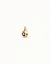 Charm de piercing plateado con forma de ojo, engastado con un cristal Swarovski color azul claro (light sapphire).