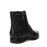 Botas de caña baja marca Bottero, confeccionadas en cuero negro con textura granulada. Presentan cierre lateral metálico y suela de goma con relieve antideslizante.
