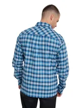 Camisa de manga larga Caterpillar de corte regular, con patrón de cuadros en tonos azules y blancos, cuello camisero, cierre frontal de botones y dos bolsillos en el pecho con solapa.