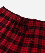 Pantalón de pijama de franela con estampado de cuadros en tonos rojos y negros, cuenta con cintura elástica y cordón de ajuste.