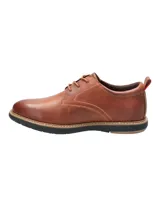 Zapato casual de cuero color marrón con cordones, costuras reforzadas y suela de EVA negra con detalle de vira clara.