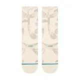 Medias Stance de caña media color crema con estampado de hojas en tonos beige y logo de la marca en el tobillo.
