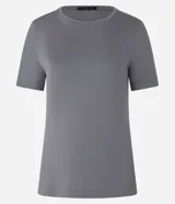 Blusa básica de viscosa y elastano de la marca Cortelle, color mostaza, con escote redondo y mangas cortas.