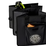 Bolso negro tipo tote con doble asa corta, bolsillo frontal con cierre de velcro y logo Rip Curl estampado.