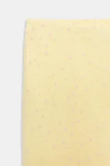 Falda midi de tiro medio, confeccionada en tejido semitransparente color amarillo con estampado de lunares diminutos en tono rosado. Cuenta con cintura elástica y forro interior a tono.