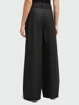 Pantalón de lona Moncler de tiro alto, color negro, con corte ancho y lazo ajustable en la cintura.