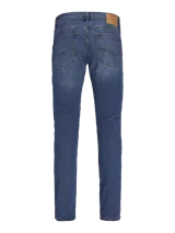 Pantalón de jean de corte slim fit, color azul denim, con tiro bajo, rodilla ajustada y pierna ceñida.