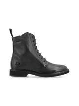 Botin acordonado de cuero vacuno con cierre lateral, diseño robusto y elegante con suela de EVA.