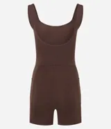 Enterito deportivo femenino Get Over de microfibra negra, con breteles anchos, escote redondeado, bolsillos laterales y diseño ajustado.