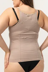 Chaleco modelador color piel con ballenas en abdomen y espalda, breteles elásticos regulables y espalda con bandas cruzadas para corregir la postura.