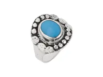 Anillo de plata 925 con piedra turquesa ovalada.