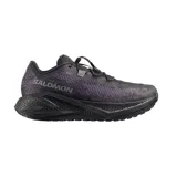 Championes de running Salomon modelo Aero Glide GRVL, color negro con detalles en violeta oscuro. Presentan un diseño técnico con malla transpirable, sistema de cordones de ajuste rápido y una entresuela robusta con textura alveolar para mayor amortiguación.