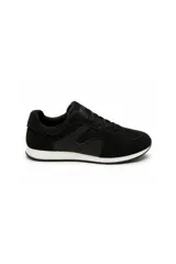 Zapatilla urbana color negro con combinacion de texturas, inserciones de malla y detalles de gamuza sintetica, con suela blanca y entresuela de goma.