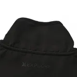 Campera polar Hurley modelo Terra, con diseño de ondas en tonos verde, marrón y beige en la parte inferior y panel superior liso en color negro. Cuenta con cierre frontal completo, cuello alto y parche con logo en el pecho.