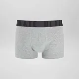 Pack de tres bóxers de hombre con cintura elástica con la inscripción "Ultimate". Un bóxer es gris liso, otro es verde con estampado de aguacates y el tercero es negro con estampado de hamburguesas.