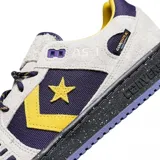 Championes Converse CONS AS-1 Pro Suede, color gris con detalles en azul marino y amarillo.