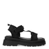 Sandalias de plataforma estilo chunky color negro, con tiras de tela ajustables mediante velcro y suela de goma dentada.