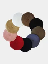 Boina de paño en varios colores.