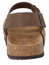 Sandalias de cuero color café RKF modelo Commet, con diseño de doble tira ajustable con hebilla metálica y tira trasera en el talón. Cuenta con base anatómica de corcho y suela de goma.