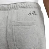 Pantalón de jogging Jordan Essentials Fleece, color gris melange, con cintura elástica ajustable mediante cordón negro, bolsillos laterales y logo Jumpman bordado en la pierna izquierda.