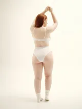 Culotte de lycra color blanco, de corte alto a la cintura.